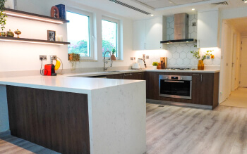 Walnut Kitchen with Geometric Backsplash